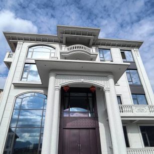 鹰潭白麻别墅外墙干挂石材效果示例