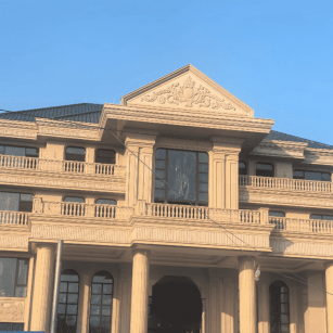 鹰潭黄金麻别墅外墙干挂石材效果示例